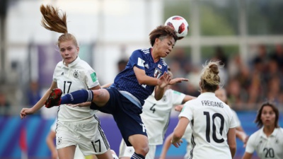 Riko Ueki dans un duel aérien avec Nuesken (photo FIFA.com) Riko Ueki dans un duel aérien avec Nuesken (photo FIFA.com)