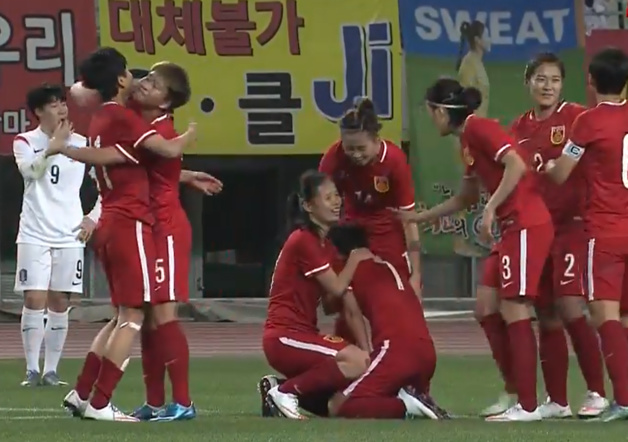 La joie chinoise au coup de sifflet final (capture image CCTV5) La joie chinoise au coup de sifflet final (capture image CCTV5)