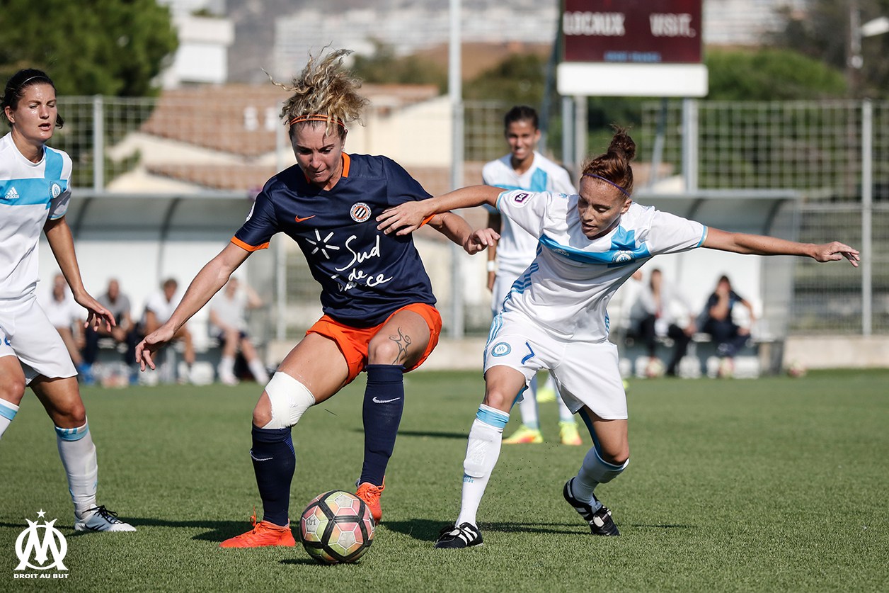 Tonazzi et Coton-Pélagie lors du match OM - Montpellier (photo OM.net)
